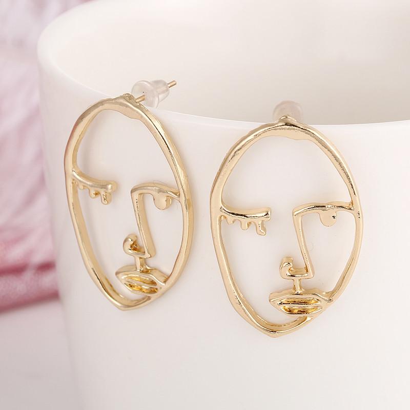Bare Face Earrings
